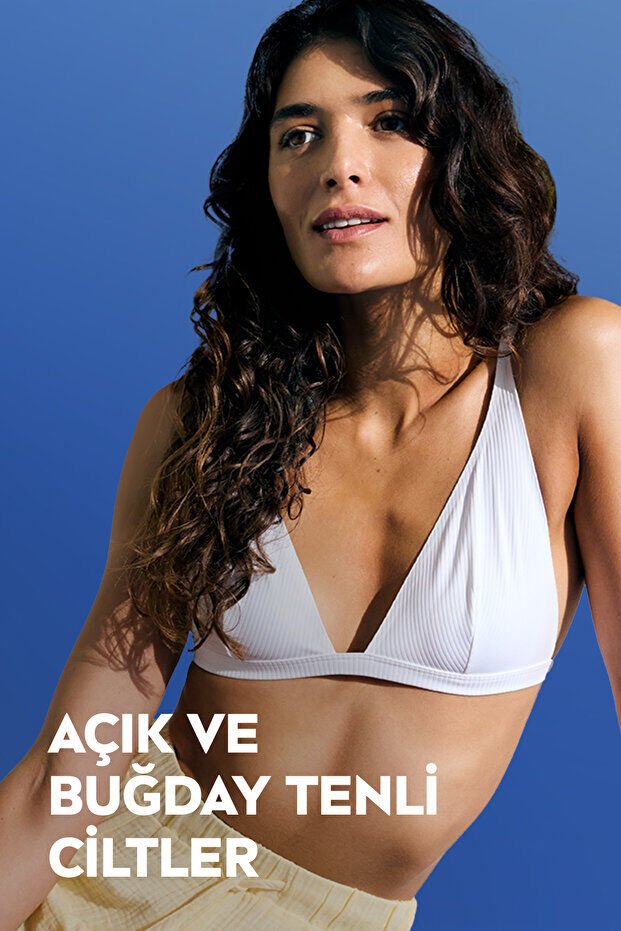 NIVEA Q10 Sıkılaştırıcı ve Bronzlaştırıcı Vücut Losyonu 250ml, Nemlendirici, Kademeli Bronzluk, Esnek Cilt